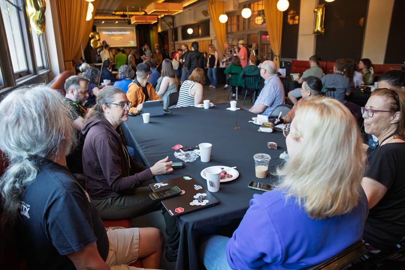 Attendees writing together at Writing Day